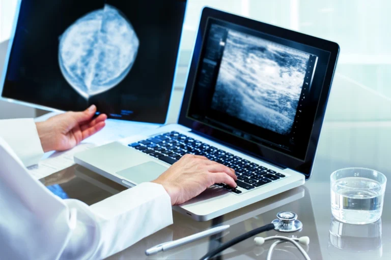 Ultrasound Technologist Views Patient's Ultrasound Results