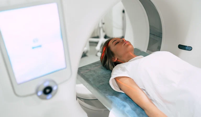 Woman Lying Down During CT Scan