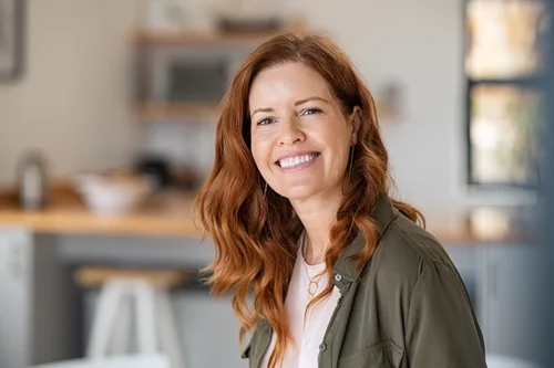 Adult Woman In Kitchen After Prioritizing Her Health